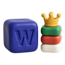 A mustard crown on top of a tower of letter blocks.